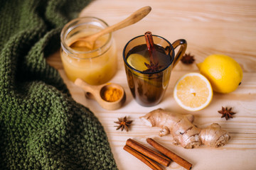 Cup warm water with lemon, honey, ginger, cinnamon and anise.