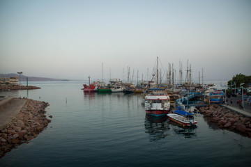 Fototapeta premium Boats in Eilat marina at sunset, Israel