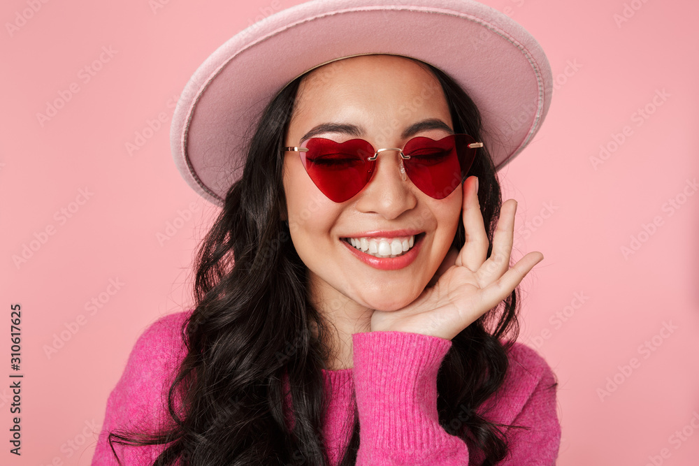 Sticker image of asian girl with long dark hair wearing hat and sunglasses smiling