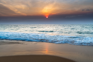 Fototapeta na wymiar Smoky Red Summer Sun Seascape