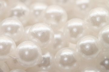 Fototapeta na wymiar Pearl nacrous beads bunch jewelry isolated white background