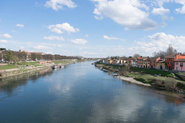 View of a river and its green banks in spring