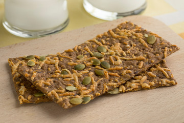 Close up of cheese cracker with pumpkin seed