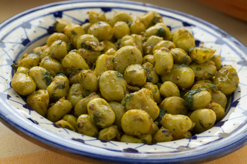 Moroccan dish with broad bean salad