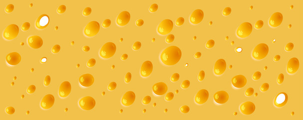 Background of thin slice of hard yellow cheese with holes