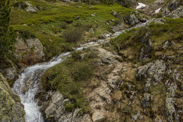 Fototapeta na wymiar Aerial view of mountain brook in French Alps