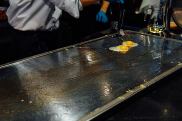 Fried and boiled eggs omelet breakfast in the kitchen