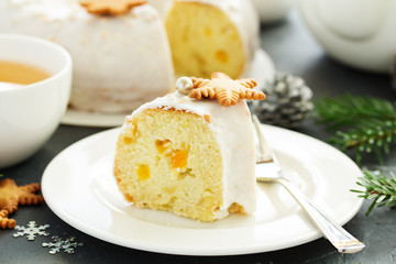 Christmas cupcake with spices, candied fruits, with gingerbread cookies and nuts.