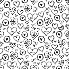 Seamless vector pattern with doodle hearts on white background. Heart background for valentines day and kids design. Can be used for wallpaper, textile and wrapping paper.