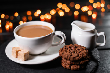 A cup of hot chocolate with gingerbread