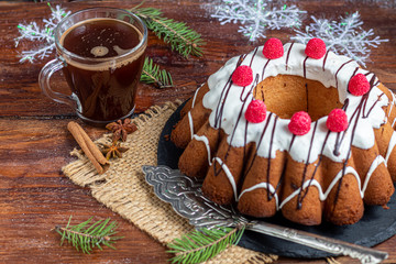 Beautiful festive cupcake decorated with whipped squirrels and raspberry jelly.