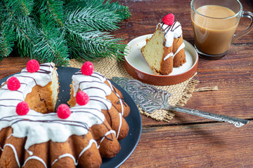 Beautiful festive cupcake decorated with whipped squirrels and raspberry jelly.
