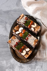 Chocolate halva with different nuts