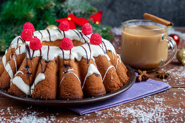 Beautiful festive cupcake decorated with whipped squirrels and raspberry jelly.