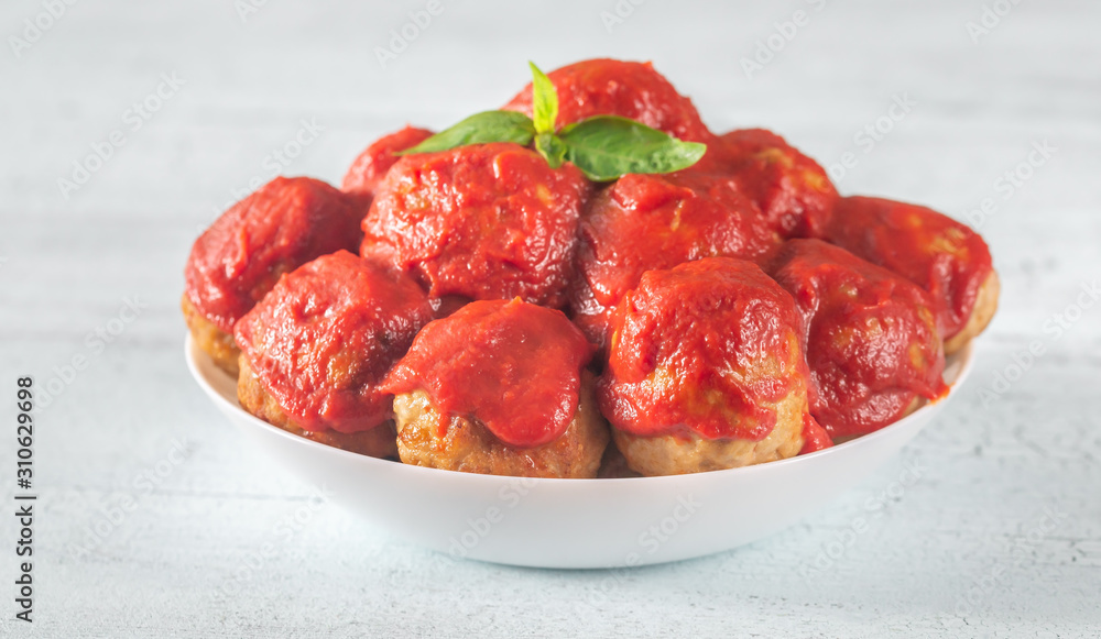 Wall mural bowl of meatballs with tomato sauce