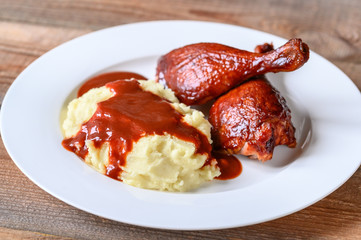 Barbecue duck legs with mashed potato