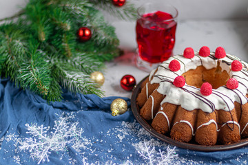 Naklejka na ściany i meble Beautiful festive cupcake decorated with whipped squirrels and raspberry jelly.
