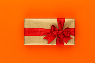 Christmas gift boxes with ribbons on color tabletop.
