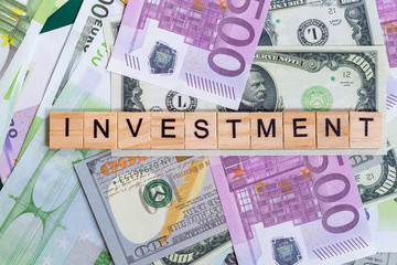 word text investment on the money banknotes background