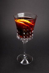 glass of wine in the studio on a gray background