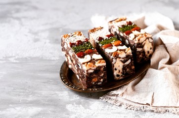 Chocolate halva with different nuts