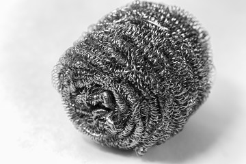 metal dishwashing sponge on white background