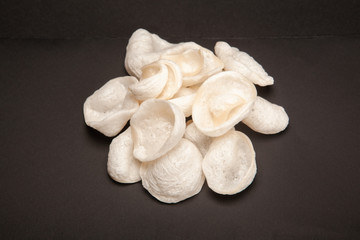 white chips on dark background