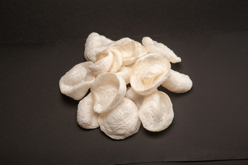 white chips on dark background
