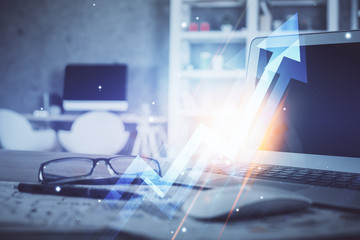 Computer on desktop with point up arrows hologram. Double exposure. Concept of success.