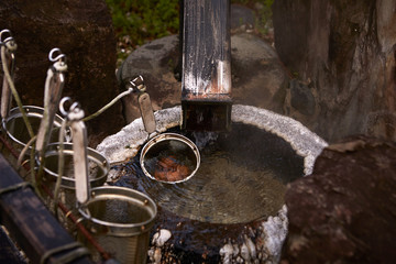 Hot spring with strainer for boiling egg