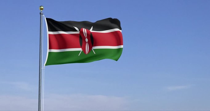 Flag of Kenya blowing in the wind with blue sky