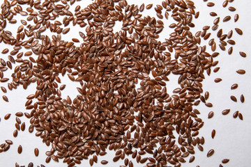 Linseeds on a white background. Nutrition source and vitamins