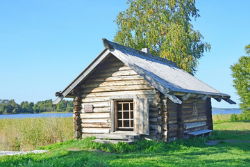 Fototapeta na wymiar Russia, Karelia. Old bath on the shore of lake Onega in Kizhi