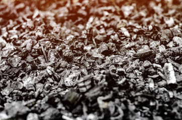 Ashes, black embers. Background burnt fire bonfire