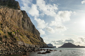 Beautiful wet stones illuminated by the sun in the Faroe Islands