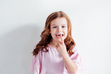 little girl brushing his teeth with a toothbrush dentistry tooth