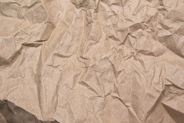 Close up of brown crumpled paper texture background.