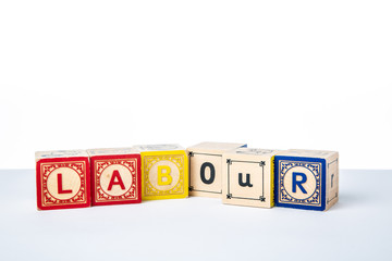 Childrens Wooden Alphabet Blocks Spelling the Word Labour © monitor6