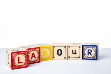 Childrens Wooden Alphabet Blocks Spelling the Word Labour © monitor6