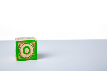 Childrens Wooden Alphabet Block Showing the Letter O