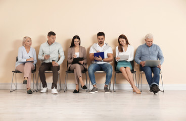 People waiting for job interview in office