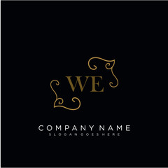 Fototapeta na wymiar Initial letter WE logo luxury vector mark, gold color elegant classical