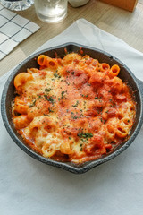 Baked creamy, mac and cheese with minced meat, italian ground beef bolognese casserole