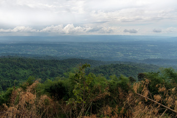 beautiful blue sky high peak mountains mist fog wildlife green forest at Khao Koh, Phu Tub Berk, Phetchabun, Thailand  guiding idea long weekend for backpacker camping campfire relaxing hiking