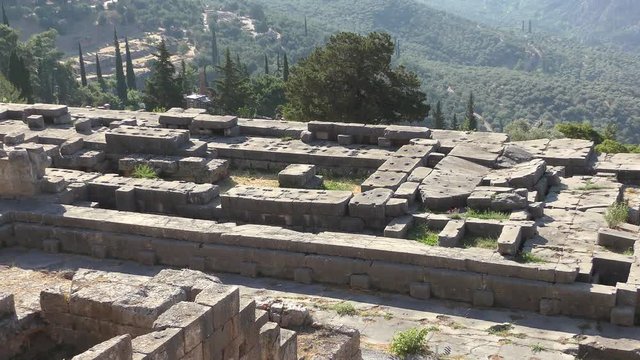 Apollo Temple in Delphi archaeological site at the Mount Parnassus. Delphi is famous by the oracle at the sanctuary dedicated to Apollo. UNESCO World heritage. Greece