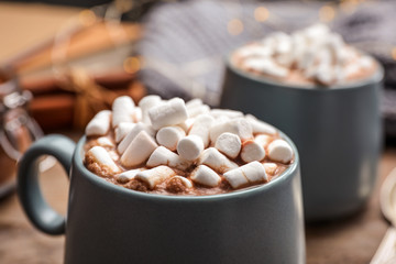 Cup of delicious hot cocoa with marshmallows, closeup