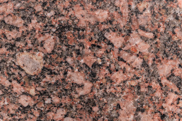 brown polished ural stone in the wall