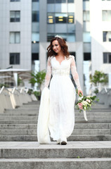 Beautiful bride in white dress with crown