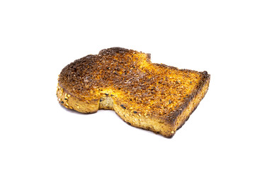 Burned slice of toast isloated on white background.
