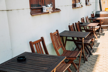 Restaurant empty tables and chairs in Lednice, Czech Republic